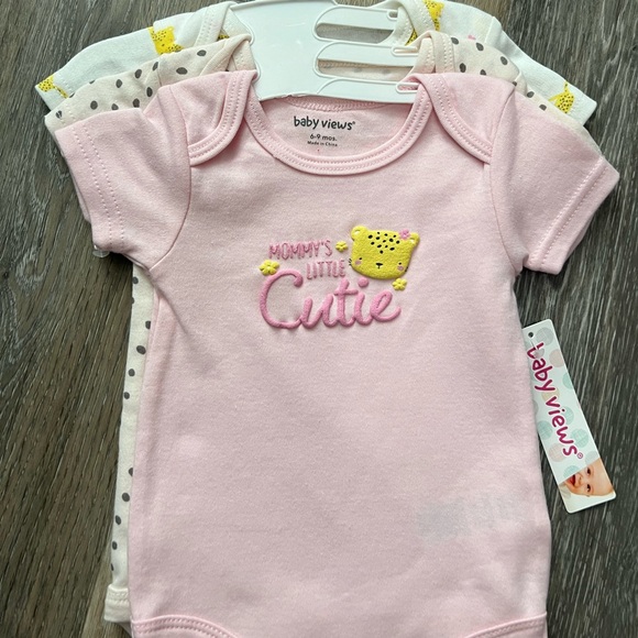 This is a set of three baby onesies by Baby Views, in size 6-9 months - Picture 2 of 2